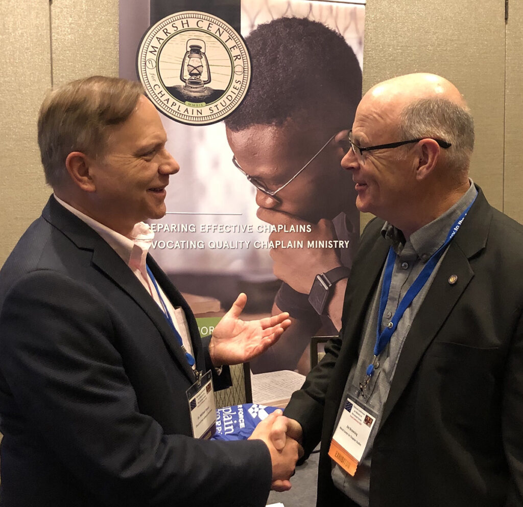 Dr. Jim Browning engages an endorser for military chaplains.